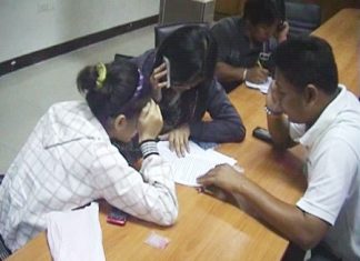 The two alleged female drug dealers are charged at Pattaya Police Station.